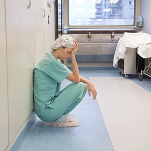 young nurse dealing with nurse burnout and fatigue