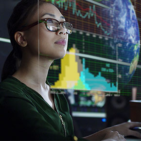 woman surveying projected data