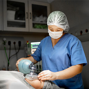 nurse anesthetist in operating room administering anesthesia