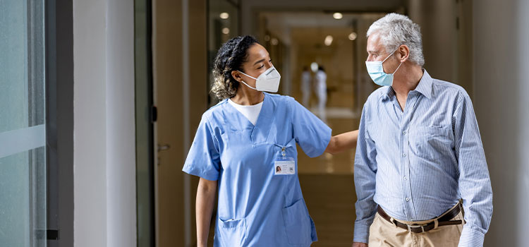 nurse navigator walking with patient