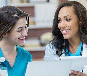 nurses meeting together