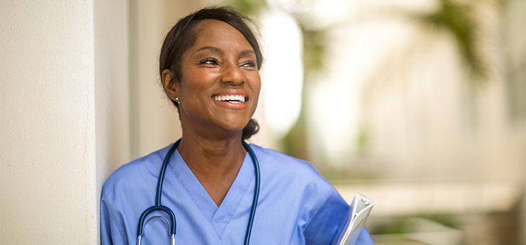 smiling nurse in medical facility