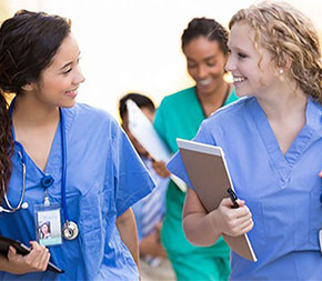 nurses walking together talking