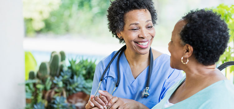 registered nurse talking with patient