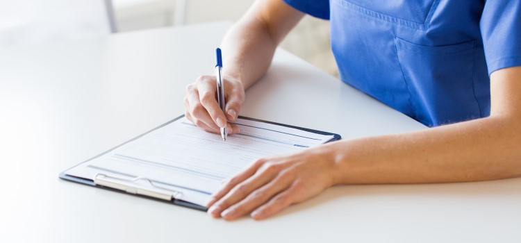 close-up of nurse applying for her license