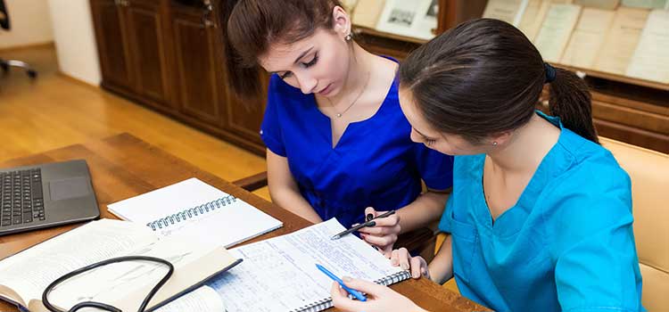 two nurses studying together