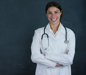 virginia nurse standing with arms folded