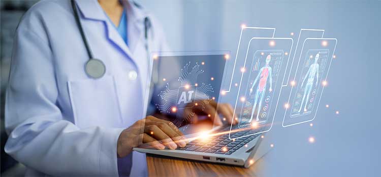 nurse projects patient vitals using AI on laptop